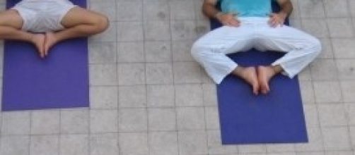 Una classe di Yoga, la disciplina tradizionale