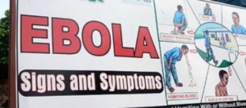 Un cartellone che descrive i sintomi dell'ebola