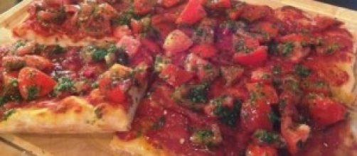 Pizza caprichosa, especialidad italiana.