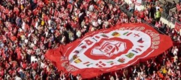 Arsenal football fans with flag Arsenal football fans with flag