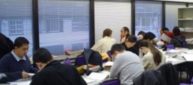 Busy university students in meeting Busy university students in meeting