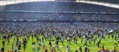 Manchester city pitch invasion