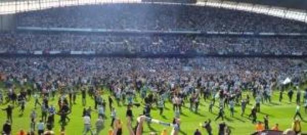 Manchester city pitch invasion Manchester city pitch invasion