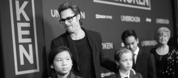 Brad Pitt y sus hijos en el estreno de Unbroken. Brad Pitt y sus hijos en el estreno de Unbroken.