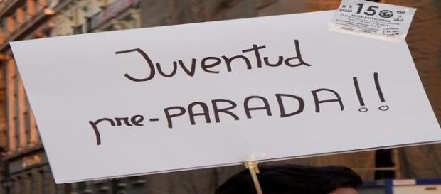 Pancarta en manifestación contra el paro juvenil Pancarta en manifestación contra el paro juvenil