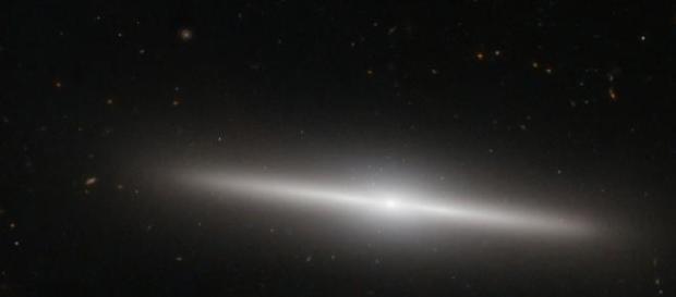 Galáxia IC335, a 60 milhões de anos-luz da Terra. Galáxia IC335, a 60 milhões de anos-luz da Terra.