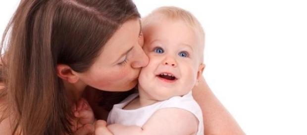 Mother and cute Baby cuddling Mother and cute Baby cuddling