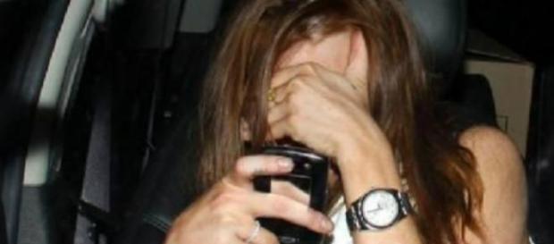 Una donna vittima di stalking Una donna vittima di stalking