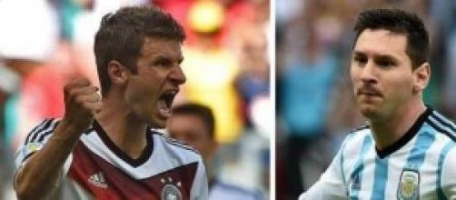 Thomas Muller and Lionel Messi prepare to face-off