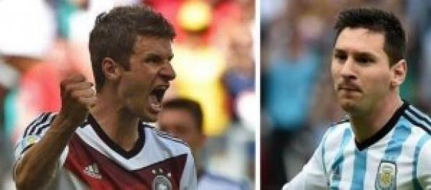 Thomas Muller and Lionel Messi prepare to face-off Thomas Muller and Lionel Messi prepare to face-off