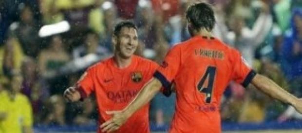 Messi y Rakitic celebrando un gol Messi y Rakitic celebrando un gol
