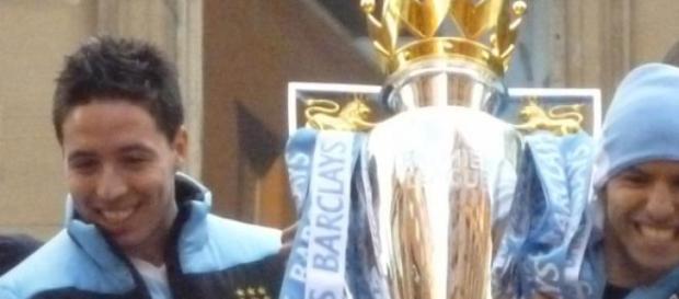 Nasri and Aguero with the trophy Nasri and Aguero with the trophy