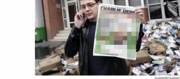 Image floutée de la une de Charlie Hebdo Image floutée de la une de Charlie Hebdo