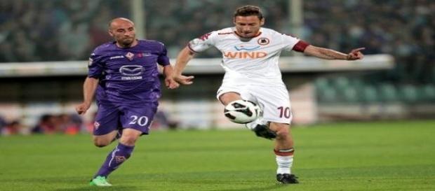 Borja Valero and Francesco Totti Borja Valero and Francesco Totti