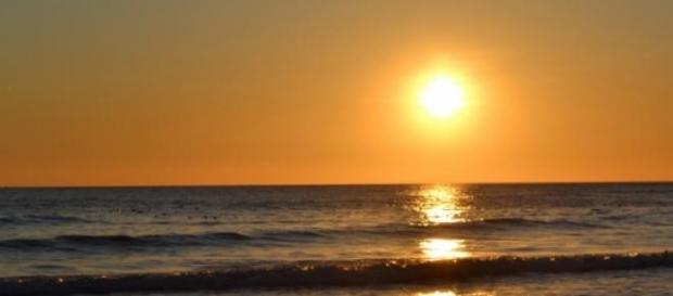 Puesta de sol en la playa Puesta de sol en la playa