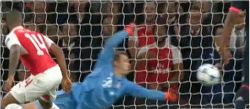 Neuer makes an astonishing save from Theo Walcott