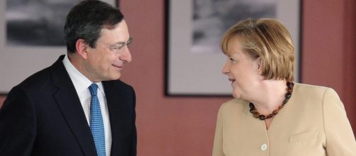 Mario Draghi (Bce) e Angela Merkel (Germania)