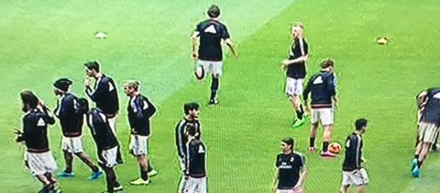 The team is on the field, warming-up The team is on the field, warming-up