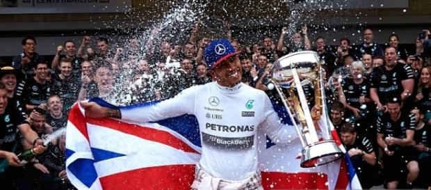 Lewis Hamilton wins third F1 world title Lewis Hamilton wins third F1 world title