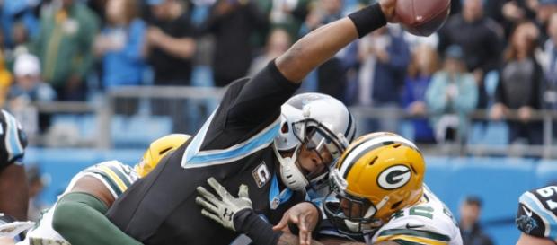 Newton soars for dunk at goal line; 3 TDs passing. Newton soars for dunk at goal line; 3 TDs passing.