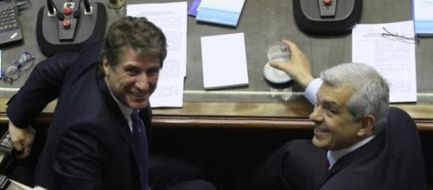 Boudou y Julián Dominguez miran a la cámara y ríen Boudou y Julián Dominguez miran a la cámara y ríen