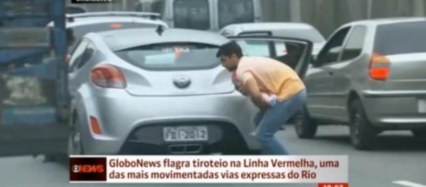 Homem protege bebê durante tiroteio no Rio Homem protege bebê durante tiroteio no Rio