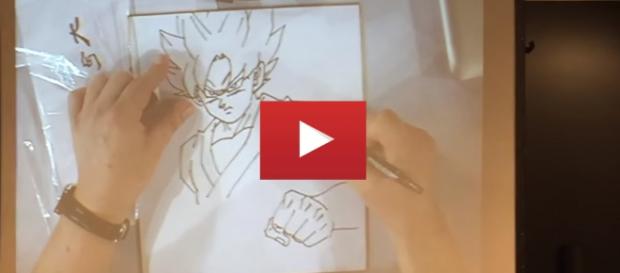 El artista japones diseñando a Goku El artista japones diseñando a Goku