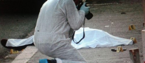 Gli scatti fotografici sulla scena del delitto.