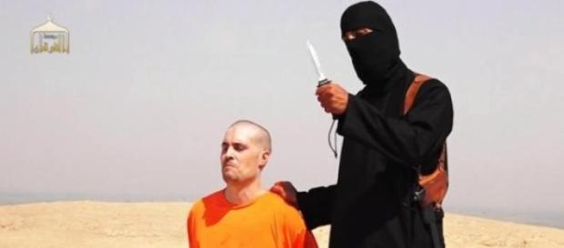 Jihadi John in an ISIS beheading video Jihadi John in an ISIS beheading video