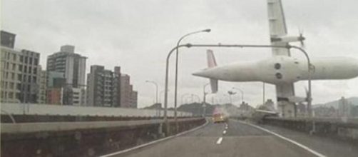 TransAsia plane plunging above freeway overpass
