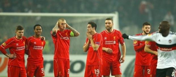 Liverpool players soak in the shock Liverpool players soak in the shock