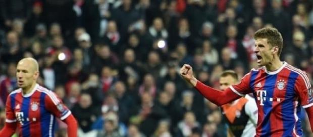 Thomas Muller celebrates scoring Bayern's opener Thomas Muller celebrates scoring Bayern's opener
