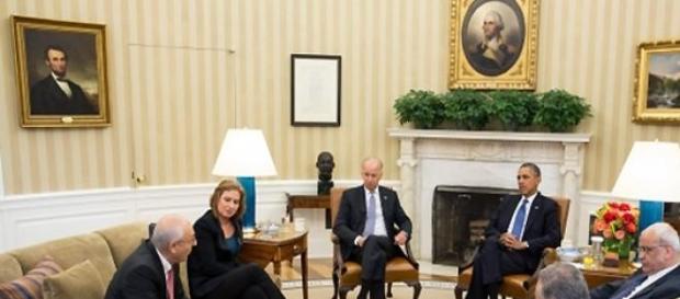 Obama with Israeli and Palestinian negotiators. Obama with Israeli and Palestinian negotiators.