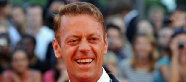 Rocco Siffredi sonriendo ante las cámaras. Rocco Siffredi sonriendo ante las cámaras.