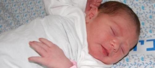 Baby girl born in a high-speed railway station