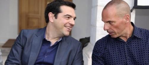 Alexis Tsipras and Yanis Varoufakis at an event.