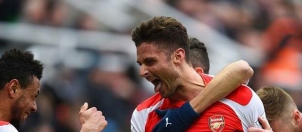 Olivier Giroud celebrates his brace for Arsenal Olivier Giroud celebrates his brace for Arsenal