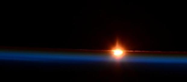 Sunrise: March 20th, 2015 eclipse over the Earth. Sunrise: March 20th, 2015 eclipse over the Earth.