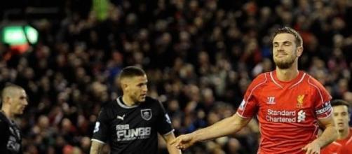 Henderson celebrates scoring Liverpool's opener 