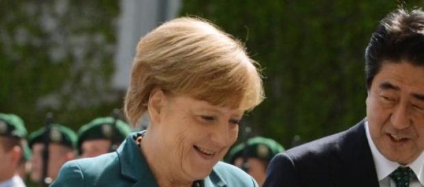 Angela Merkel si Shinzo Abe Angela Merkel si Shinzo Abe