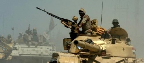 Iraqi Army tanks and APC advancing