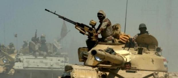 Iraqi Army tanks and APC advancing Iraqi Army tanks and APC advancing