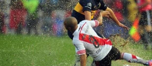 Sánchez (River) y Meli (Boca), bajo la lluvia Sánchez (River) y Meli (Boca), bajo la lluvia