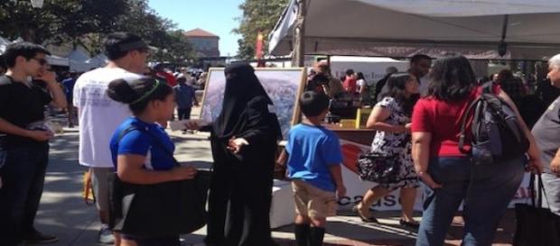 Veiled at the Quran booth, LA Festival of Books. Veiled at the Quran booth, LA Festival of Books.