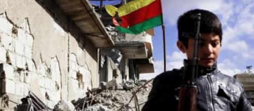 Kurdish child in Kobane - by Agostino Amato.