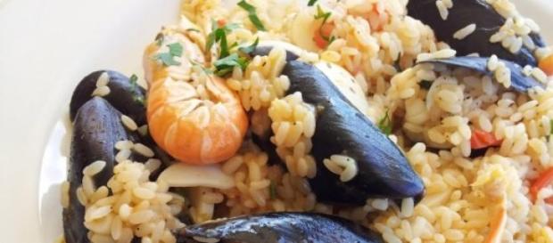 Il risotto di mare, con pesce e frutti di mare Il risotto di mare, con pesce e frutti di mare