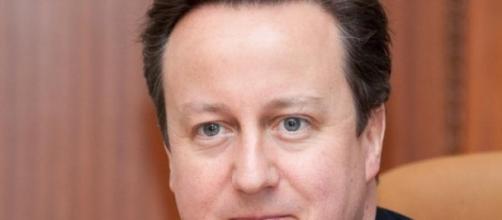 David Cameron returns to Downing Street