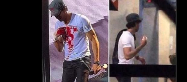 Enrique Iglesias et sa main maculée de sang. Enrique Iglesias et sa main maculée de sang.