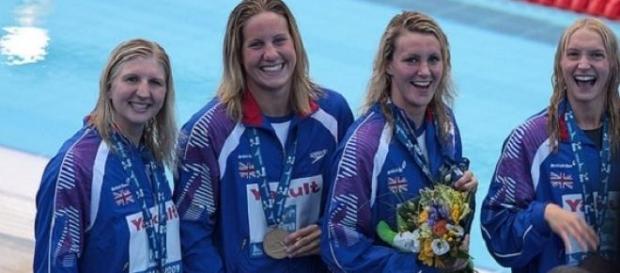 Becky Adlingon (left) during her swimming days Becky Adlingon (left) during her swimming days