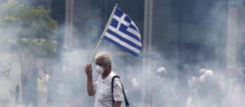 Un greco durante proteste